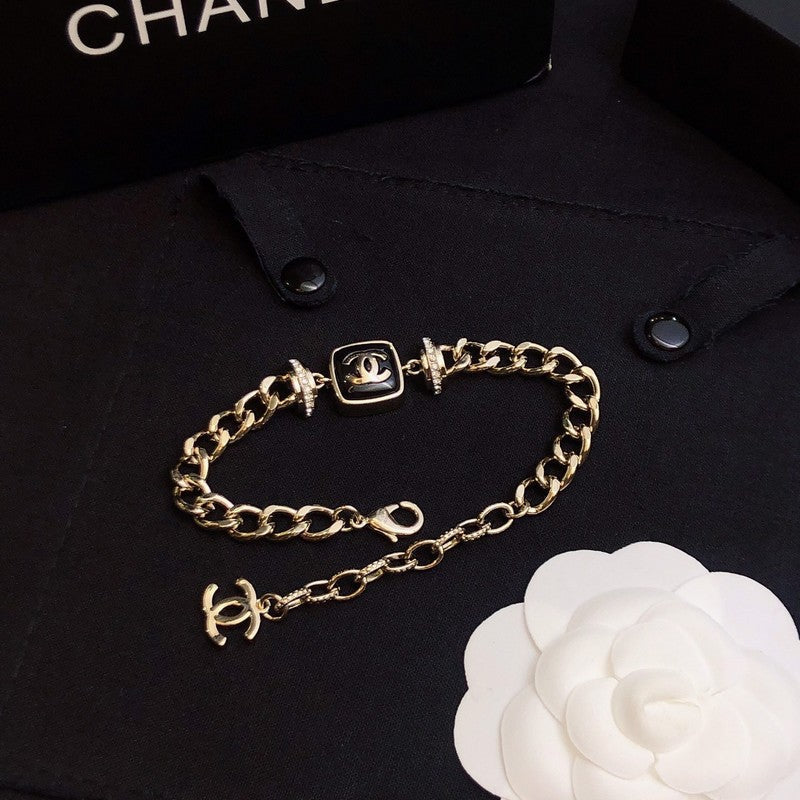 18K  Chanel Black Logo Gold Chain Bracelet