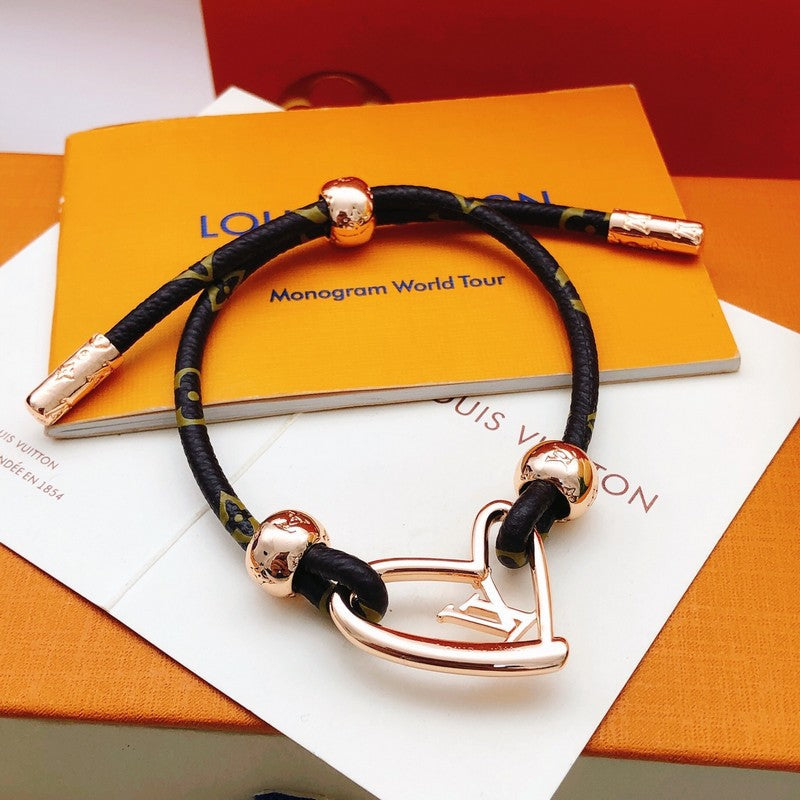 18K Louis Vuitton Heart Charm Bracelet