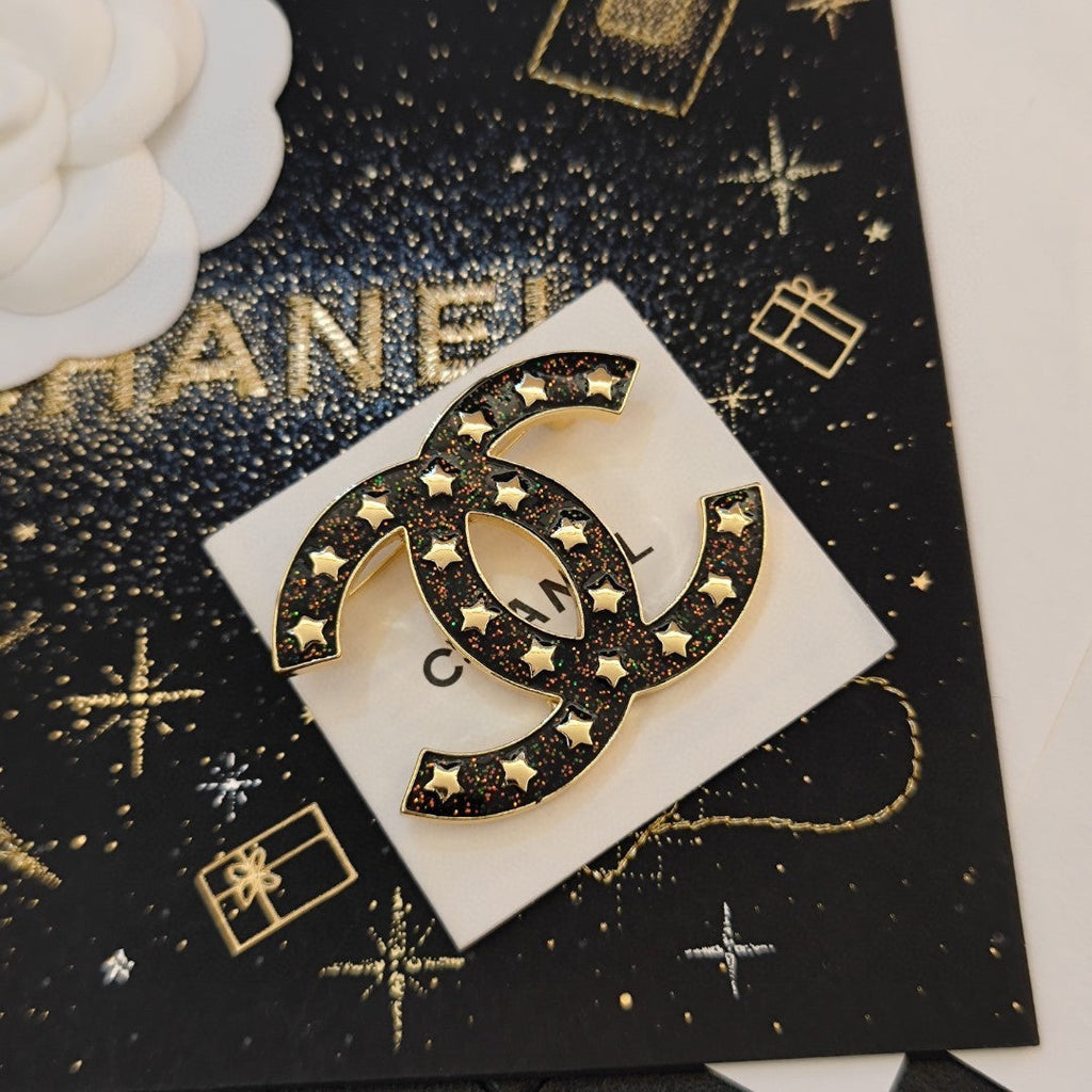18K  Chanel Black Star Brooch