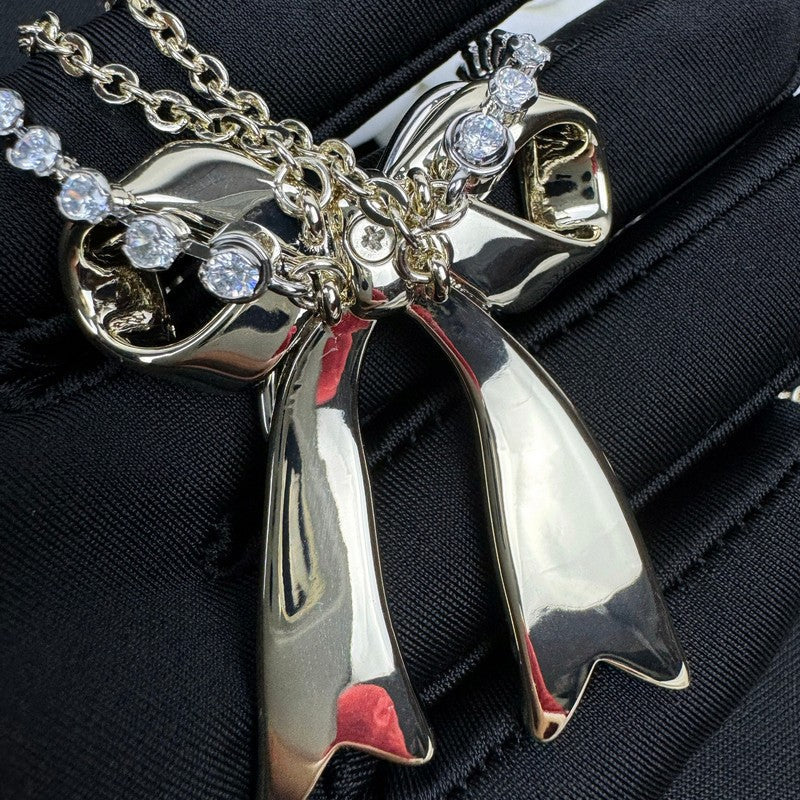 18K  Chanel 25K Bow Tie Diamond Gold Necklace