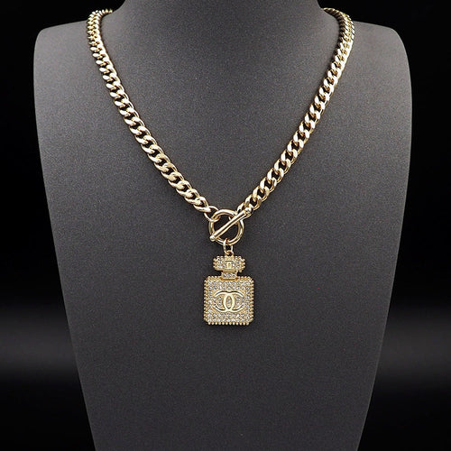 18K  Chanel Diamond Perfume Bottle Pendant Necklace